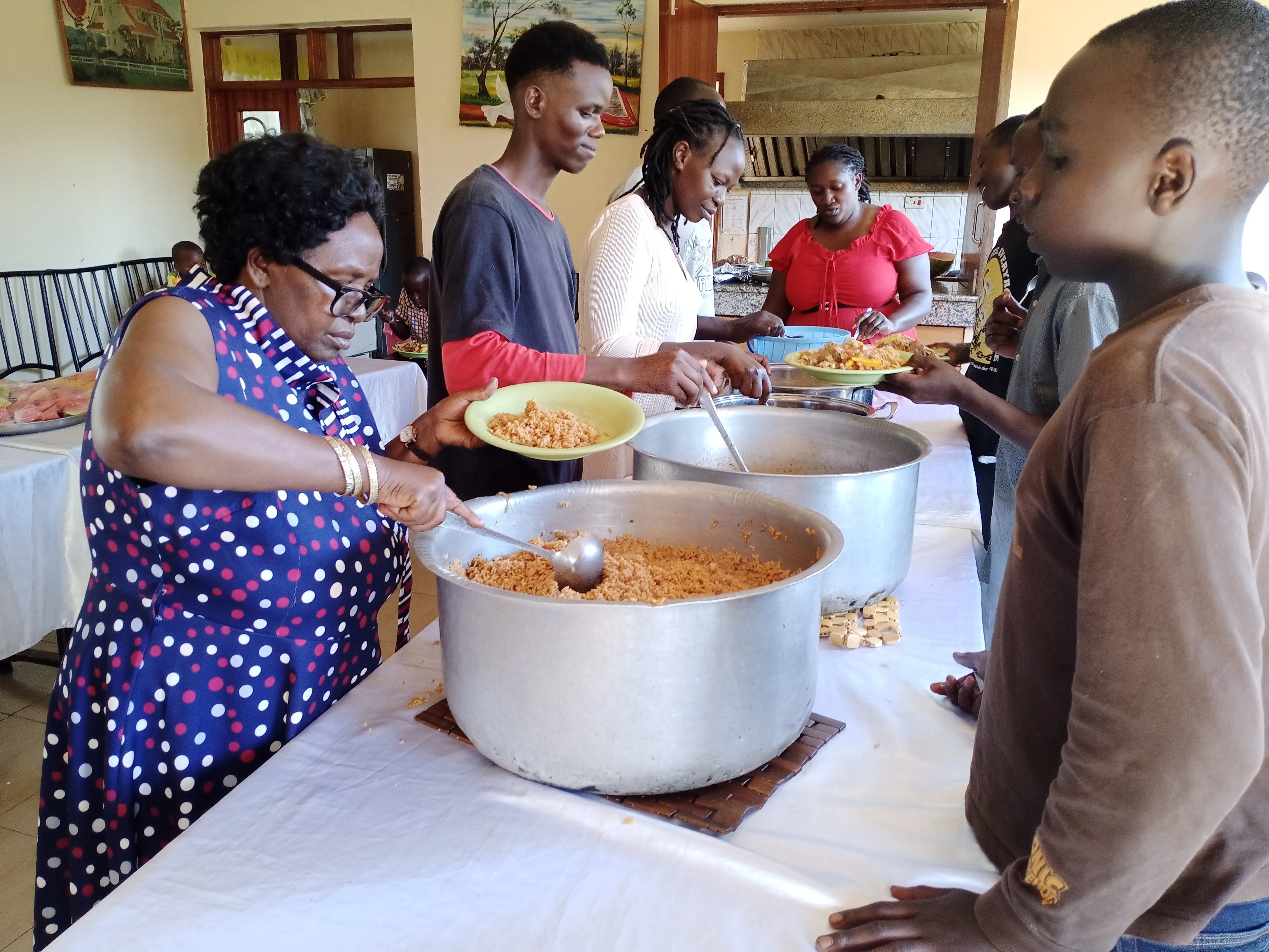 Children and caregivers during a shared meal